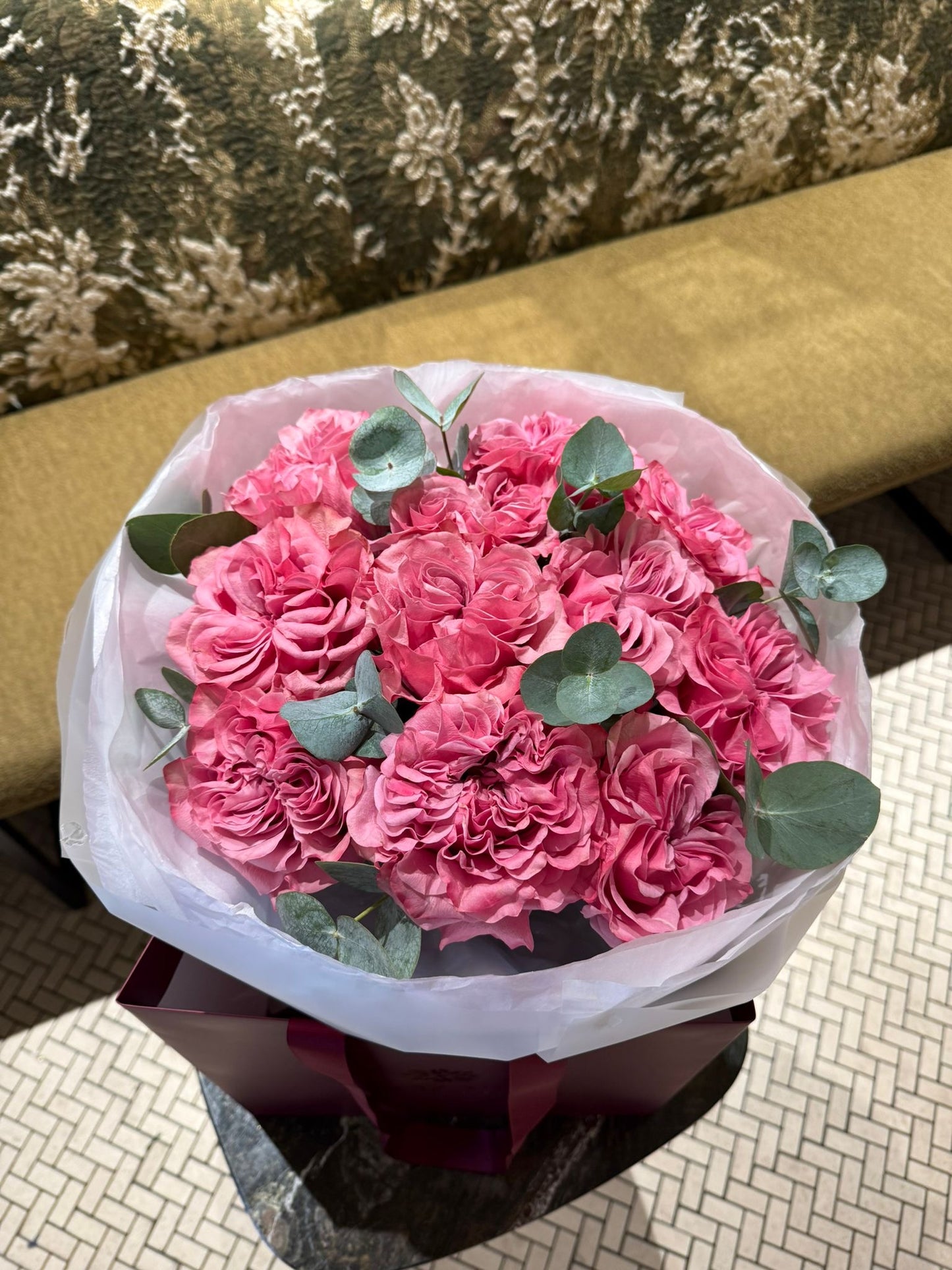 Hot pink ruffles and silvery greens – bold floral statement by Mozart Concierge