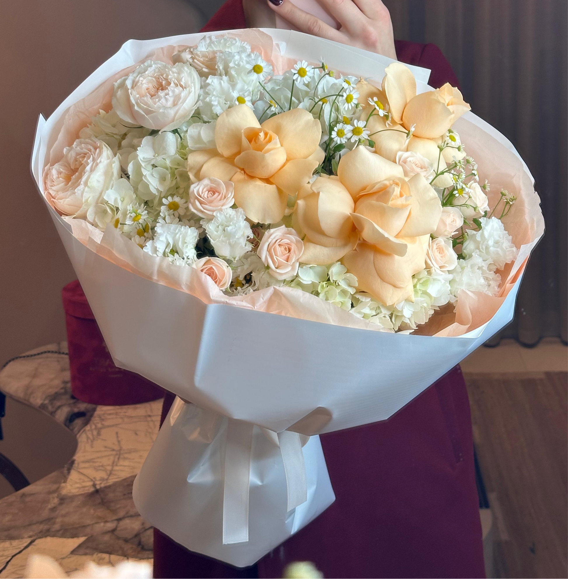 Cream and soft peach roses with romantic notes – Mozart Concierge handcrafted floral art